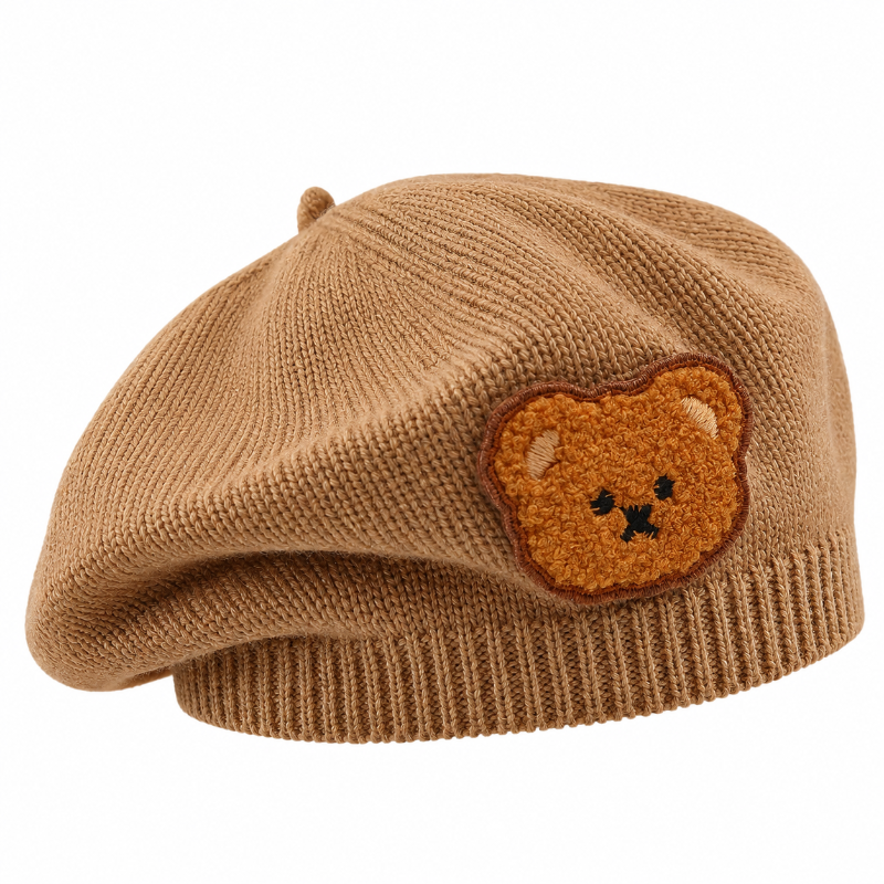 Béret bébé en maille marron avec écusson ourson