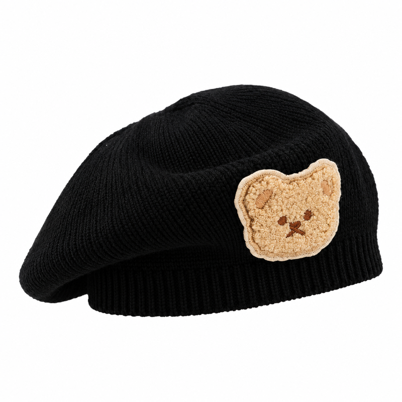 Béret bébé en maille noir avec écusson ourson