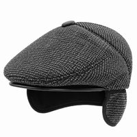 Béret homme gris noir à visière vu oreillettes 